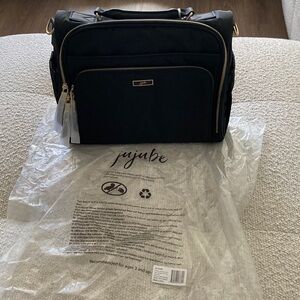 Eco BFF baby bag. Hooks on stroller. Insulated pockets. Many different options.